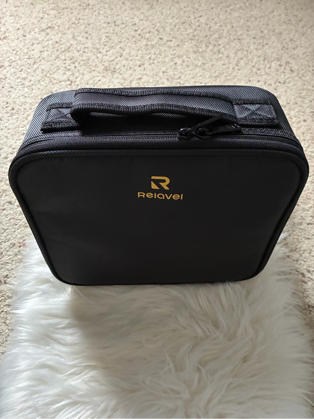 Relavel Black Travel Case with Gold Logo